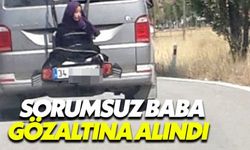 Kızını arabanın arkasına bağlayan baba gözaltına alındı