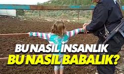 Suriyeli baba yaramazlık yapan çocuklarını çite bağladı